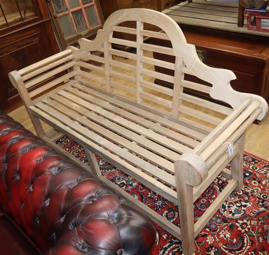 A Lutyens style teak garden bench W.165cm